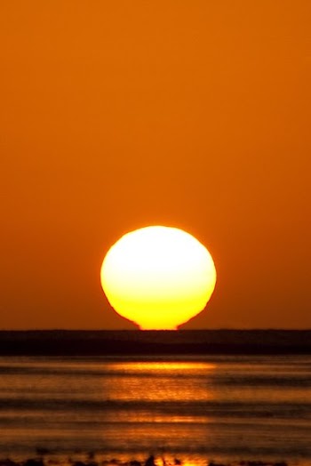 Hot Sunset Over Water