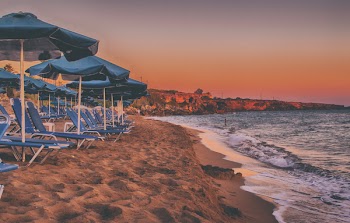 House and Parasols Near Beach