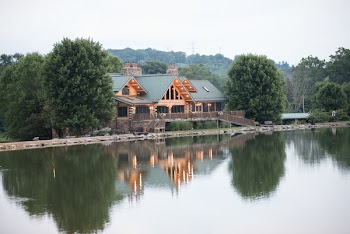 House Nearby on Calm Body of Water