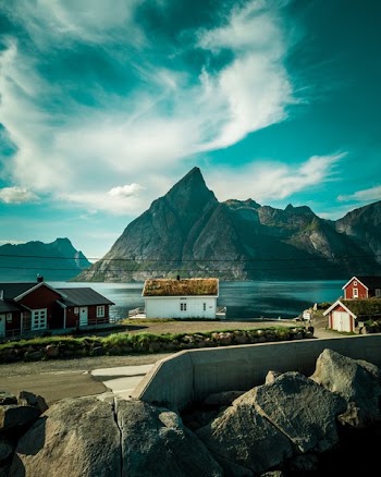 Houses Near Calm Body Of Water 