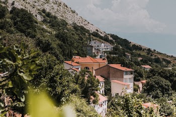 Houses On The Foot Of A Mountain