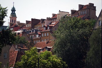 Houses With Red Brick Roofs Near Church