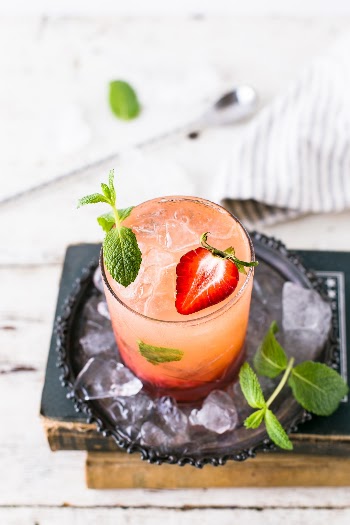 How about a Whiskey Smash? This one is made with muddled strawberries and mint. 