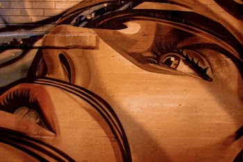 Human Face Painting On Wall