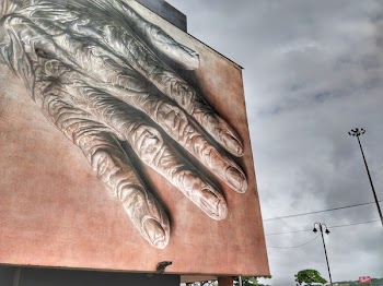 Human Hand Billboard Painting