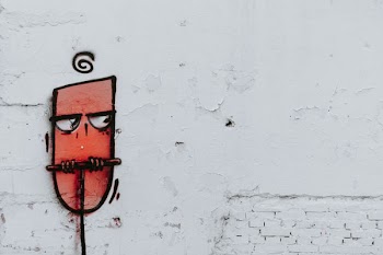 human tongue painted white wall