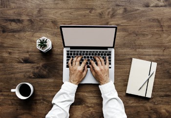 Human Using Black and Silver Laptop Computer