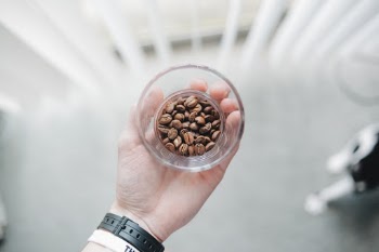 I always love taking photos of small objects by a window in my apartment. I was making coffee one morning and the thought just struck me to show off these coffee beans, and what you see is what came of it.