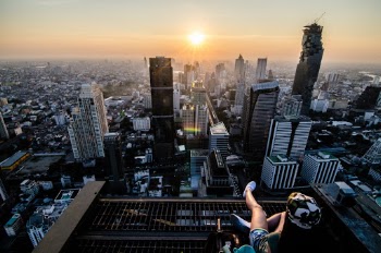 I believe that the best views in cities are totally free. If someone tries to charge for rooftop or viewpoint, just go away. 
Look around, be inventible, try to find another way and you will be surprised even if you don’t get the same point!