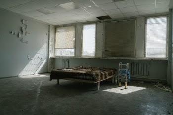 I got an exceptional possibility to visit otherwise closed houses in Tallinn, Kopli. I captured this piece in an old factory, in the living rooms. What really drew me was the randomness of every object in this room. It also had a bit of eerie energy.