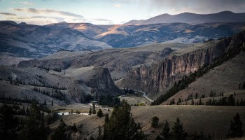 I spent the past summer working on the 4UR Ranch in southwest Colorado which provided me plenty of opportunity to capture some great shots. This particular picture looks down from the mountainside on the east side of the ranch. The Rio Grande River can be seen flowing past the entrance of the ranch as it winds its way through wagon wheel gap. 