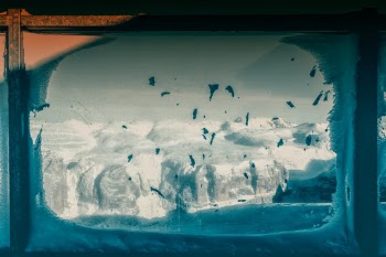 I took the photo through a windbreak on the mountain station of Sass Pordoi!
