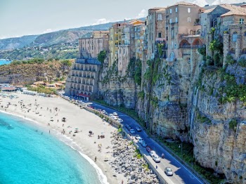 I took this photo in the beautiful Italian town of Tropea, two years ago. The city is towering above the beach, a unique scene! The water was crystal clear and a beautiful blue