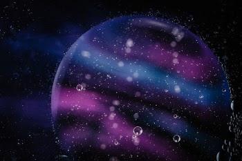 I was experimenting with water, cooking oil and different color patterns displayed by an old iPad. I like the "jupiterian vibe" of this particular bubble.