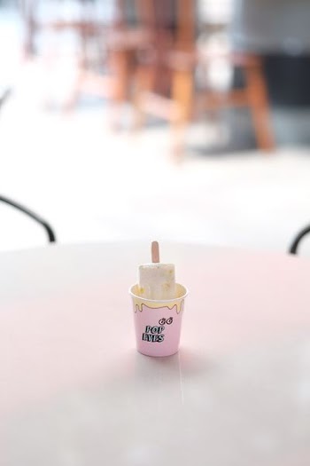 ice cream pop on pink cap