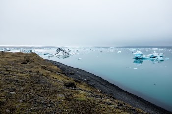 ice on body of water near the island