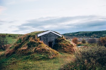 Iceland Hut In Grassy Hill