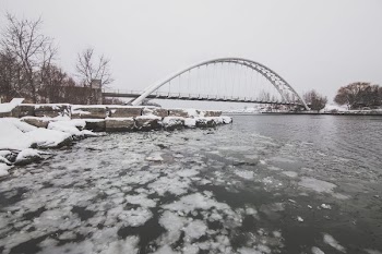 Icy Winter Water Under Bridge