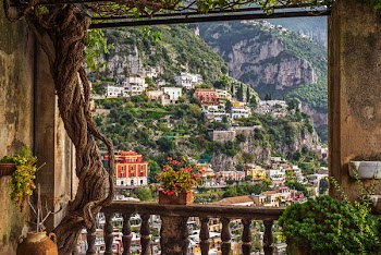 Idyllic view of the historic and famous coast village "Positano" with its church near Naples in South Italy