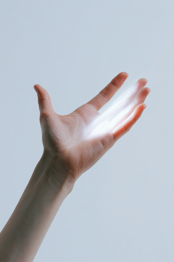 Illuminated Hand with Glowing Light