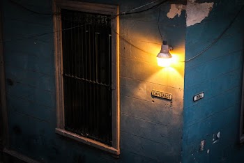 Illuminated Light Bulb OutsideThe House