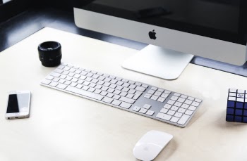 Imac Beside Apple Wireless Keyboard And Magic Mouse