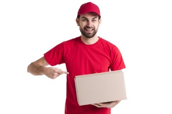 Image of a young delivery man pointing at the box Free Photo