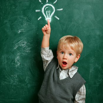 Inspiring Young Boy with Bright Idea in Classroom