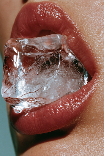 Intimate Macro of Lips with Ice Cube