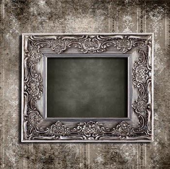 Intricate old frame hanging on grungy vintage wallpaper