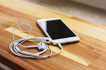 iPhone 6s with headphones