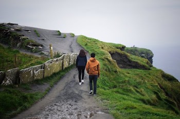 Ireland Cliffside Hikers
