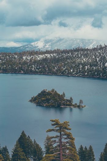 island surrounded body of water