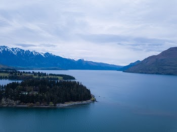 Island Surrounded by Body of Water