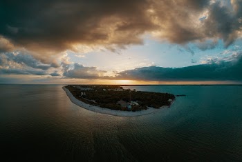 Island Under Cloudy Sky