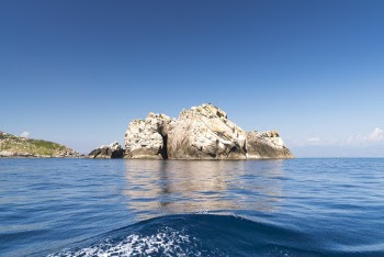 Islet Surround With Body of Water