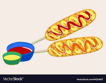isolated of two corn dogs with sauces