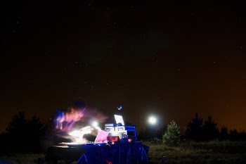 It is a unique combination of playing/listening to music during the night at outdoors.