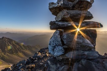 It was amazing to be on the top of Älplihorn just on time for this beautiful sunrise. I hiked and climbed a couple of hours through the night, passing some chamois and ptarmigans in the darkness, and reached the top exhausted but very happy.
