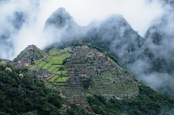 It was an amazing view at Machu Pichu in Peru with the clouds hiding part of the mountains.