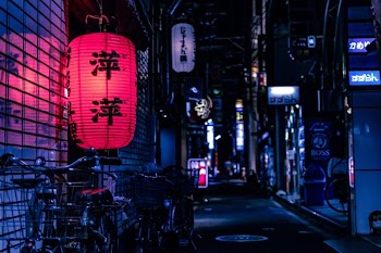 Japanese lantern over city bike at nighttime
