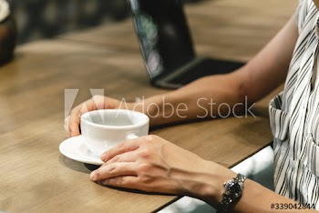 Japanese woman having a coffee