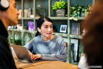Japanese woman in a cafe with her friends