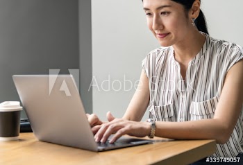 Japanese woman working on a laptop