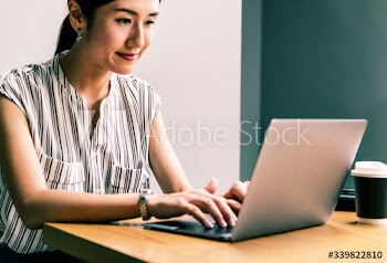 Japanese woman working on a laptop