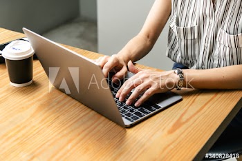 Japanese woman working on a laptop