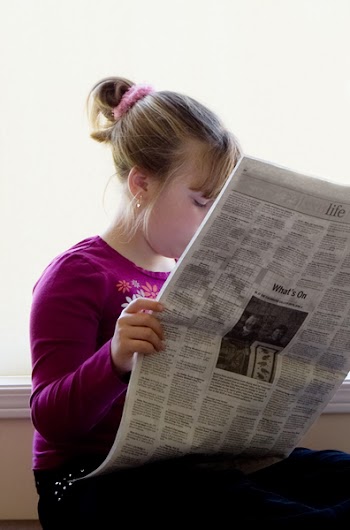JGS_GirlReadingNewspaper_03.jpg