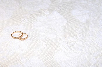JGS_WeddingRingsAndLace.jpg