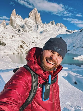Joyful Adventurer in Snowy Patagonia