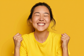Joyful Celebration: Young Woman in Yellow